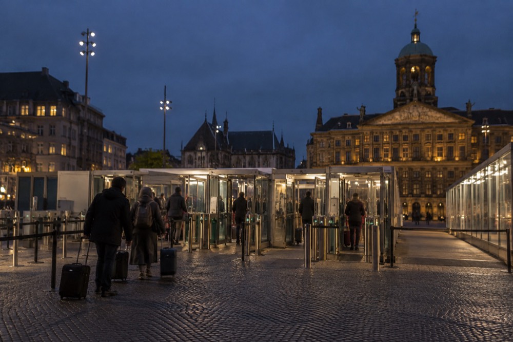 Border control booths with electronic gates in an <a href=