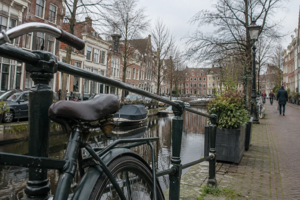 Brick facades and a quiet canal edge beside Haarlem