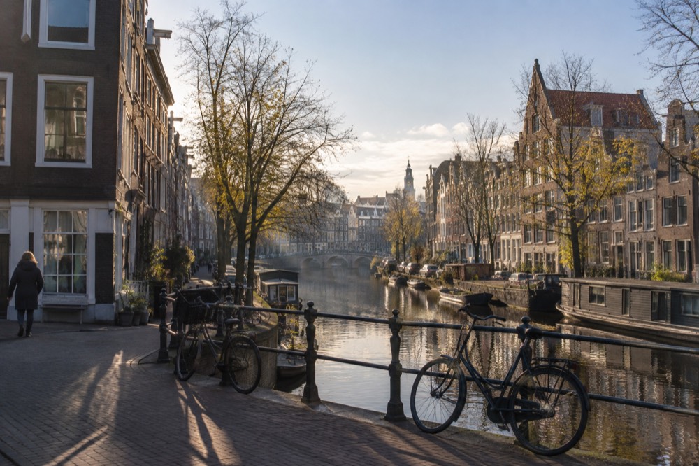 A canal bridge and moored boats close to Jordaan