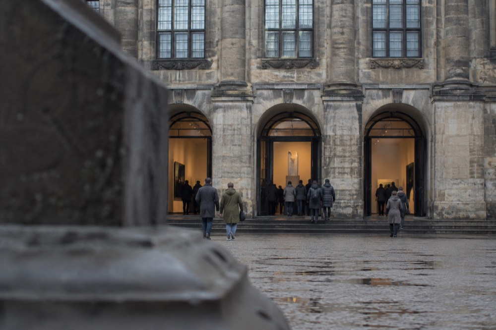 A narrow side street leading away from Dam Square