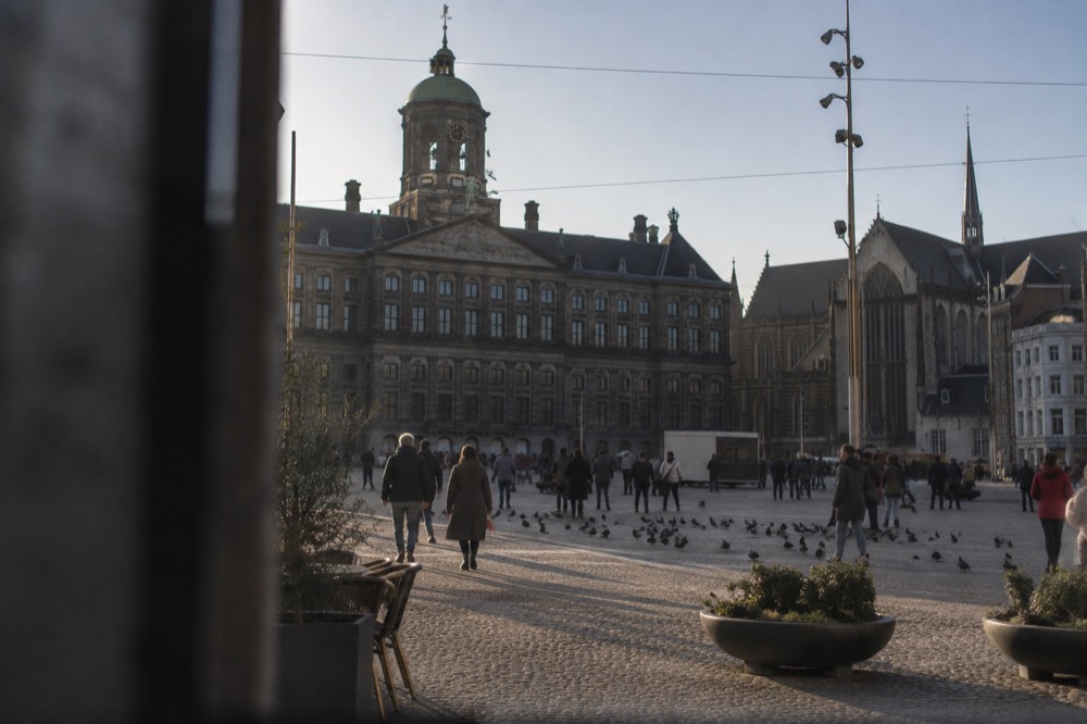 The frontage of Dam Square viewed from the opposite bank