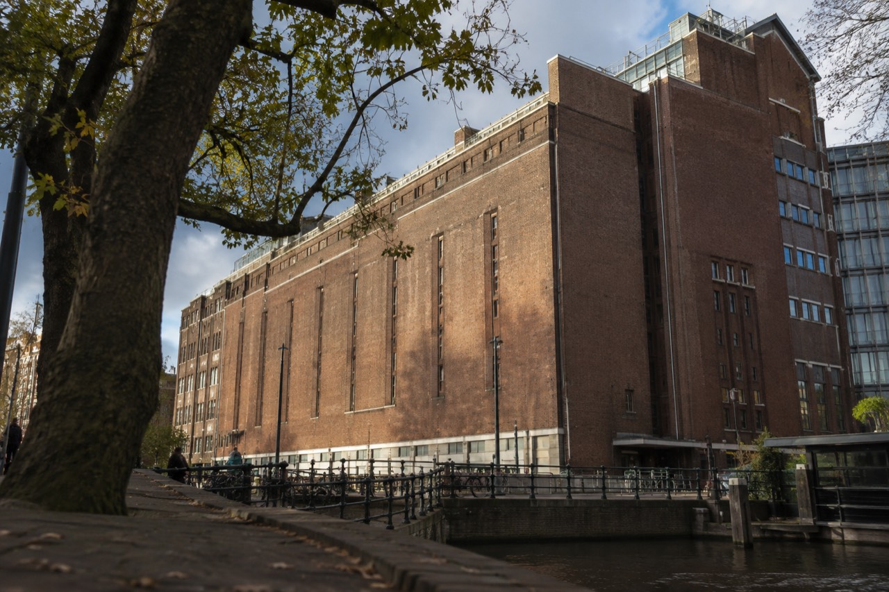 The historic brick facade of the former Heineken brewery building in Amsterdam