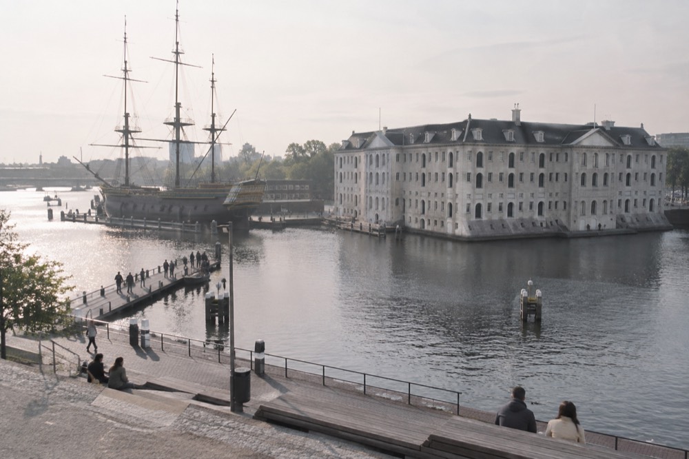 The approach to Scheepvaartmuseum, with bicycles leaning against the railings