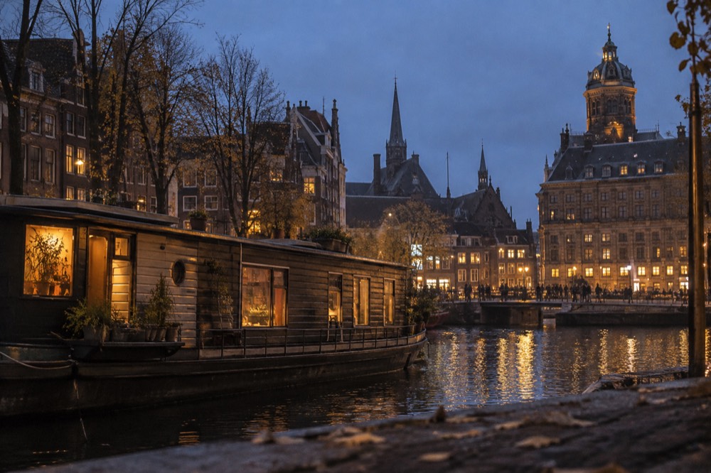 The frontage of Dam Square viewed from the opposite bank