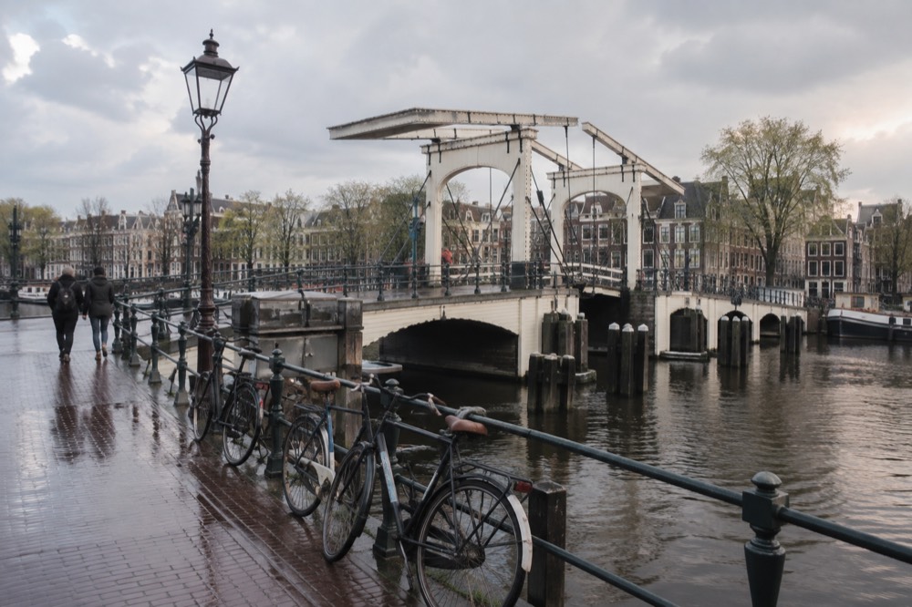A street-level view of Magere Brug on an ordinary weekday morning