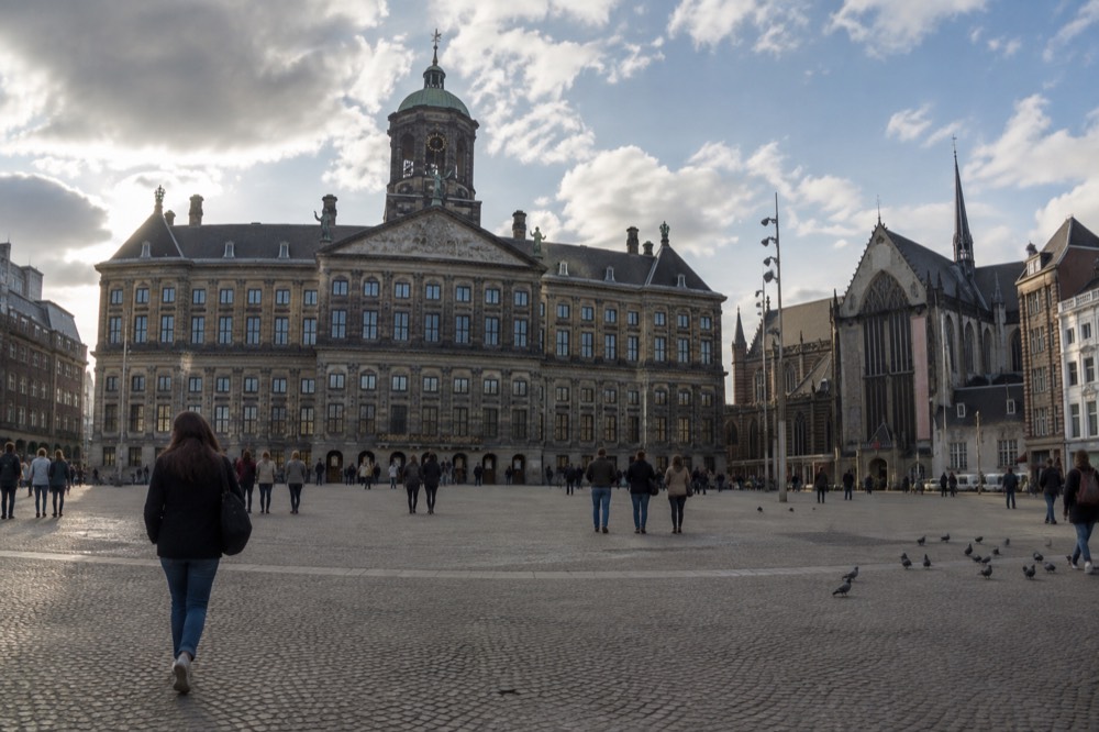 The approach to Dam Square, with bicycles leaning against the railings