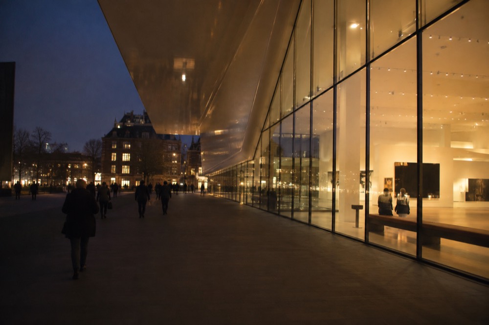 Brick facades and a quiet canal edge beside Stedelijk Museum