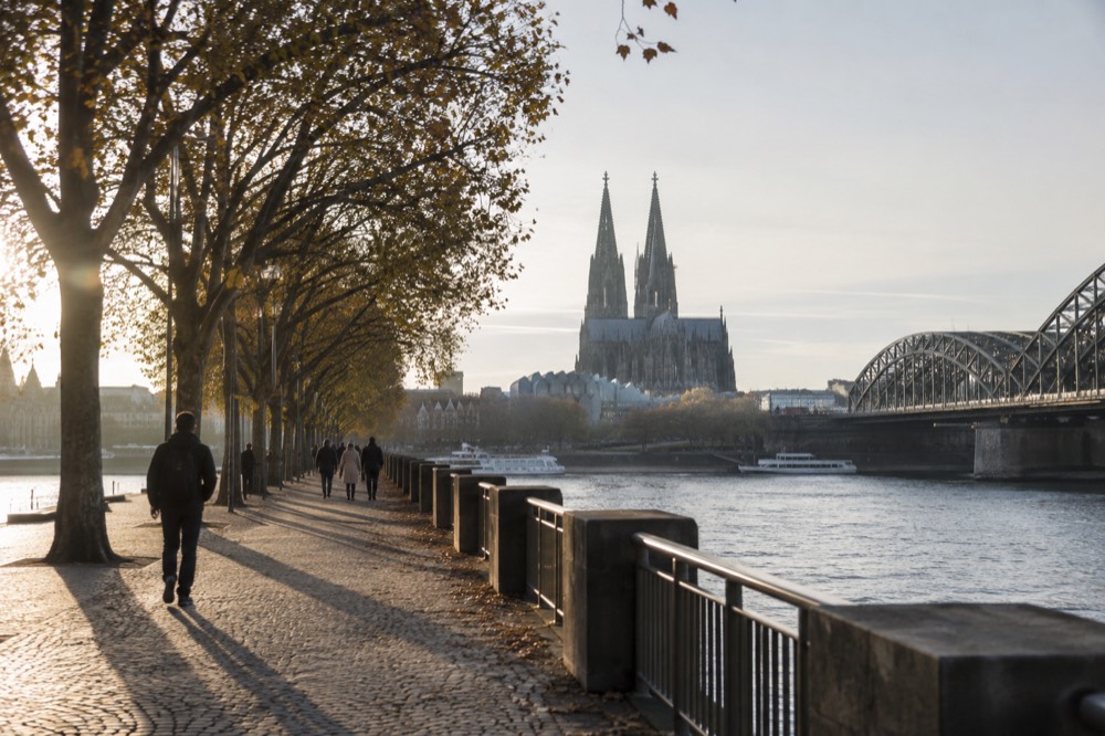 A canal bridge and moored boats close to Cologne