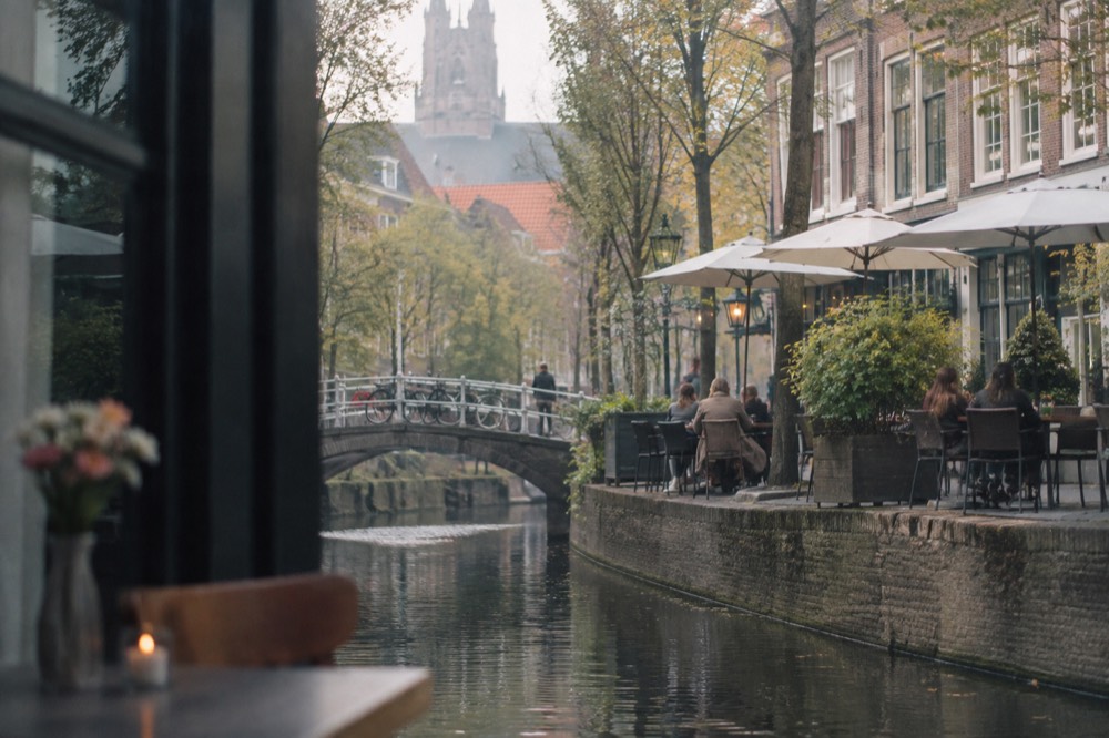 The waterfront near Delft under a broad grey northern sky