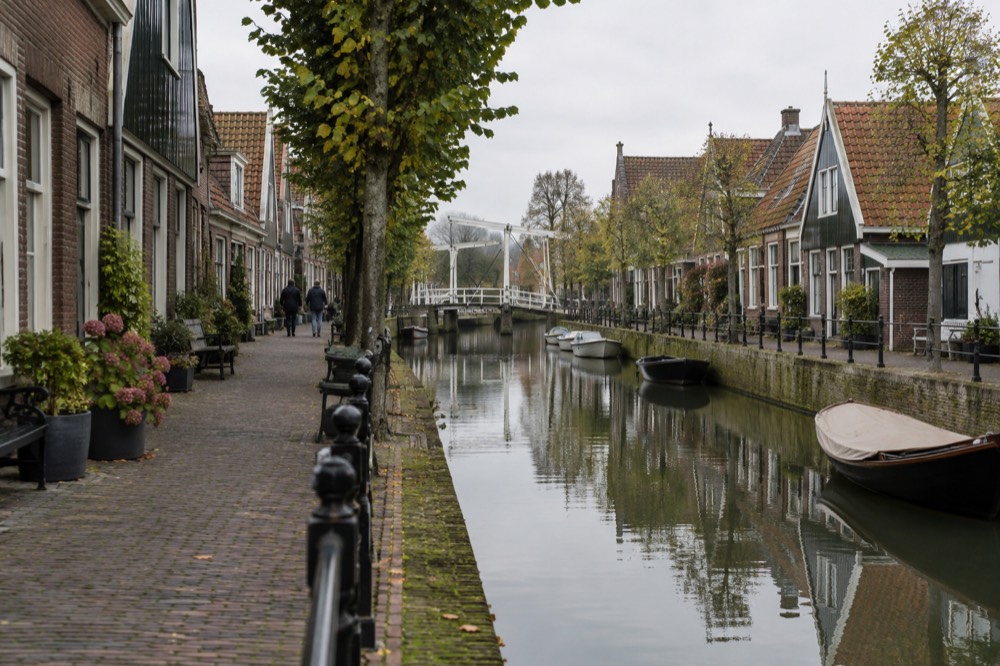 The frontage of Edam viewed from the opposite bank