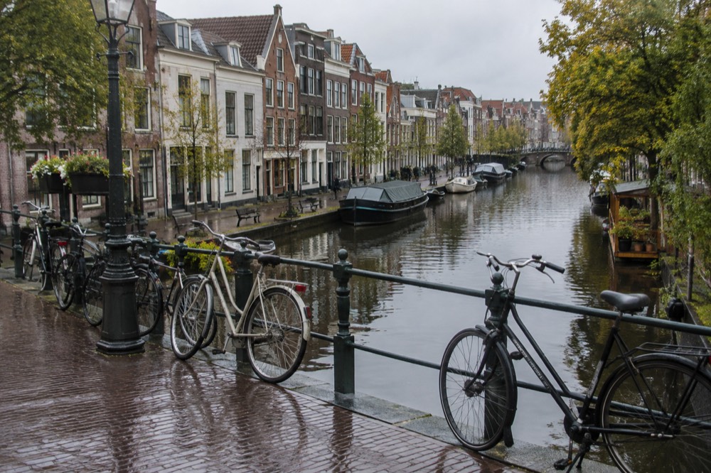 A canal bridge and moored boats close to Leiden