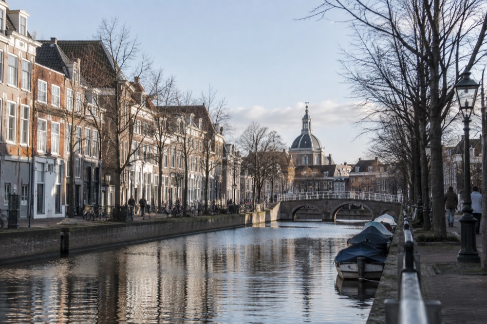 A wide view across the water towards Leiden