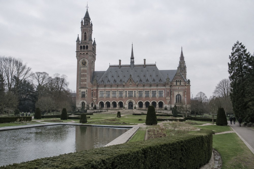 The Peace Palace in The Hague with manicured gardens
