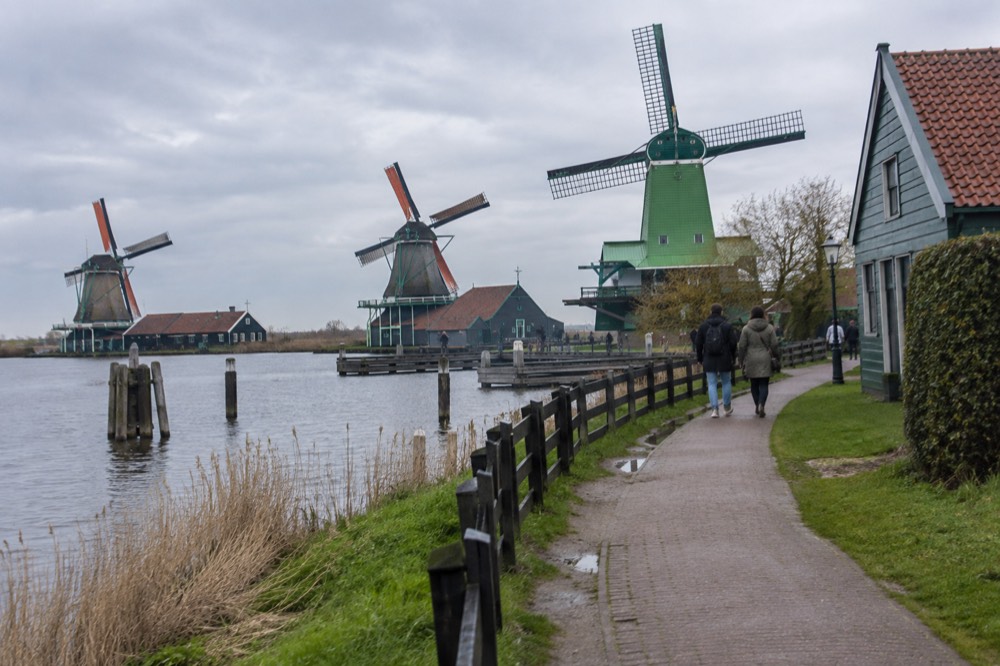 Brick facades and a quiet canal edge beside Zaanse Schans