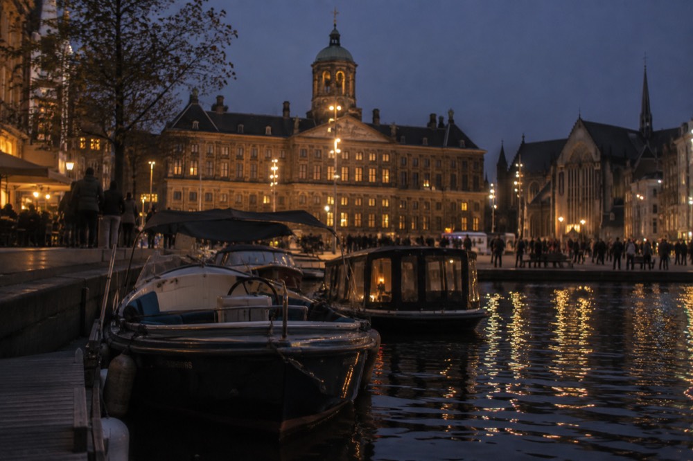The frontage of Dam Square viewed from the opposite bank