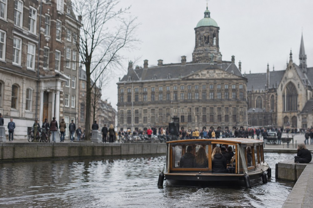 The frontage of Dam Square viewed from the opposite bank