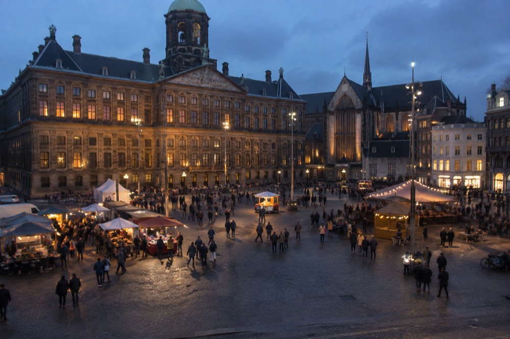 The frontage of Dam Square viewed from the opposite bank