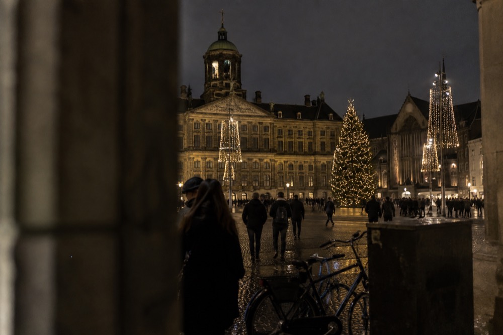The frontage of Dam Square viewed from the opposite bank