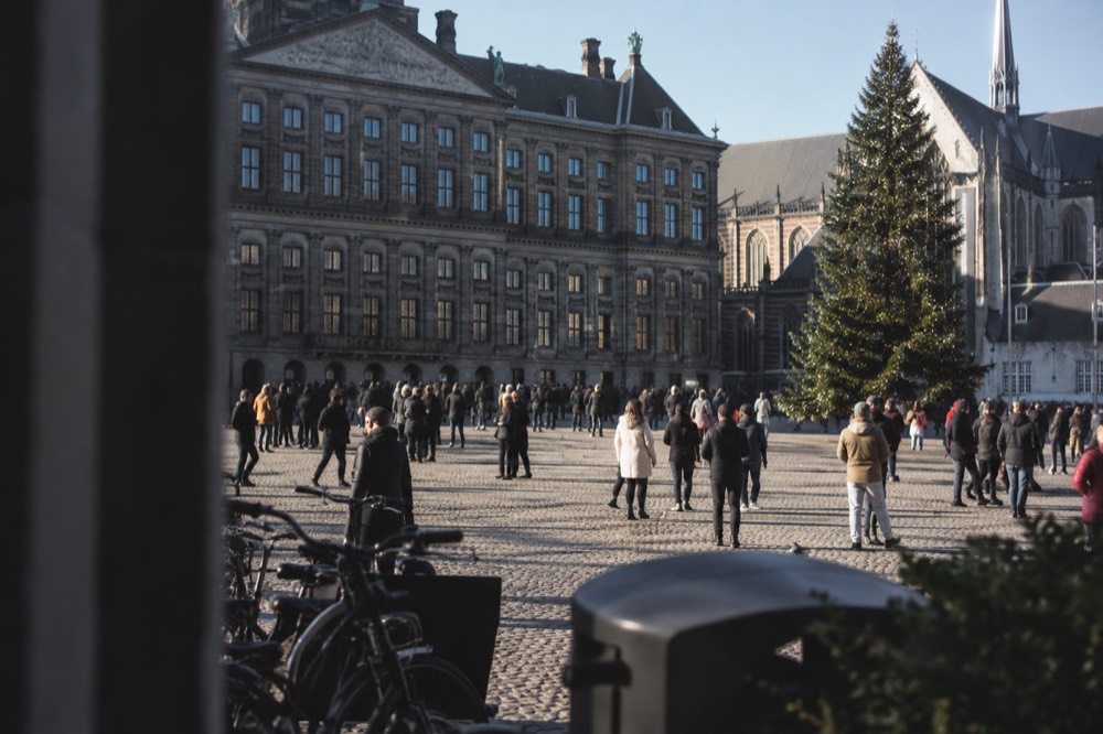 Low winter sun across the rooftops near Dam Square