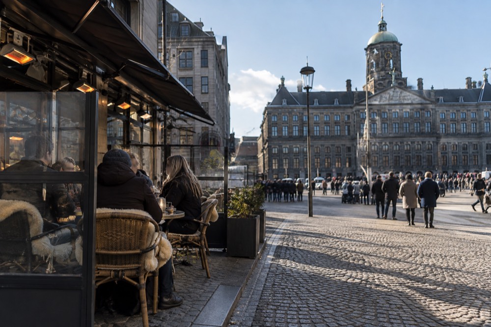 Low winter sun across the rooftops near Dam Square