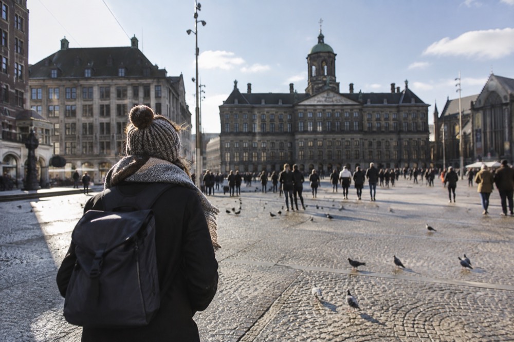 The frontage of Dam Square viewed from the opposite bank