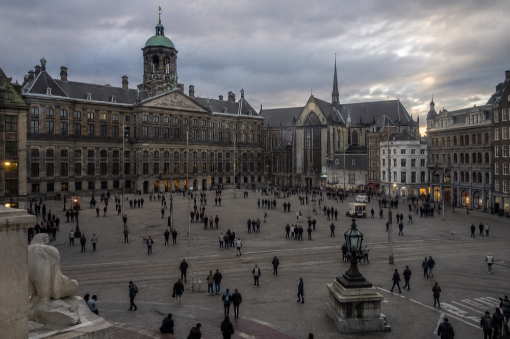 The approach to Dam Square, with bicycles leaning against the railings