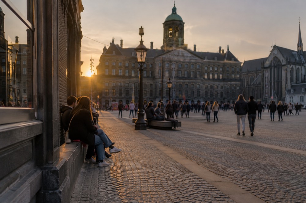 A canal bridge and moored boats close to Dam Square