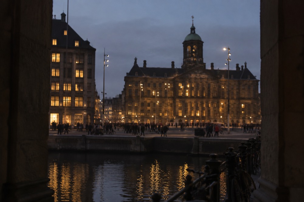 The frontage of Dam Square viewed from the opposite bank