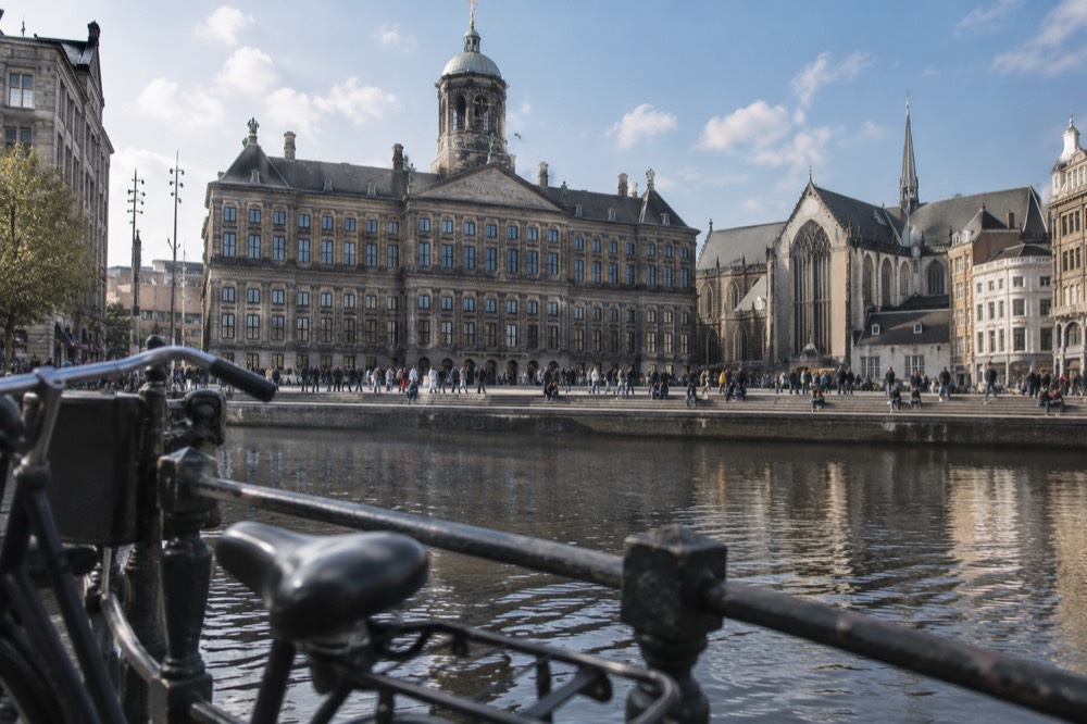 The frontage of Dam Square viewed from the opposite bank