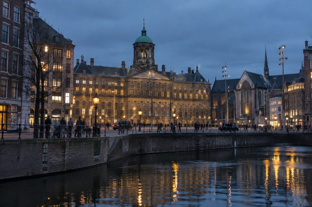The frontage of Dam Square viewed from the opposite bank