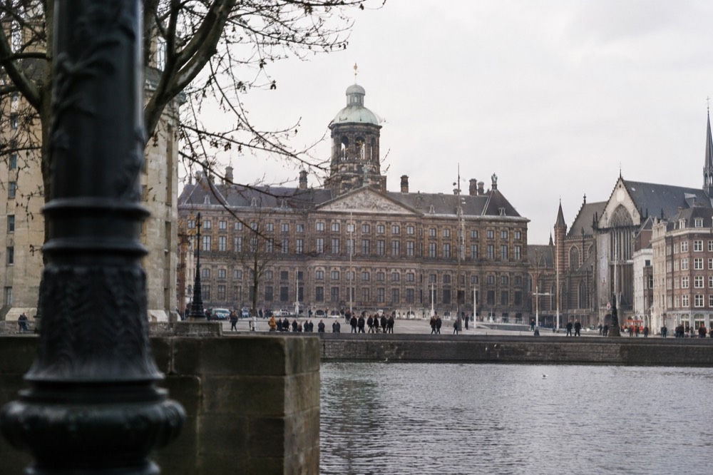 The frontage of Dam Square viewed from the opposite bank