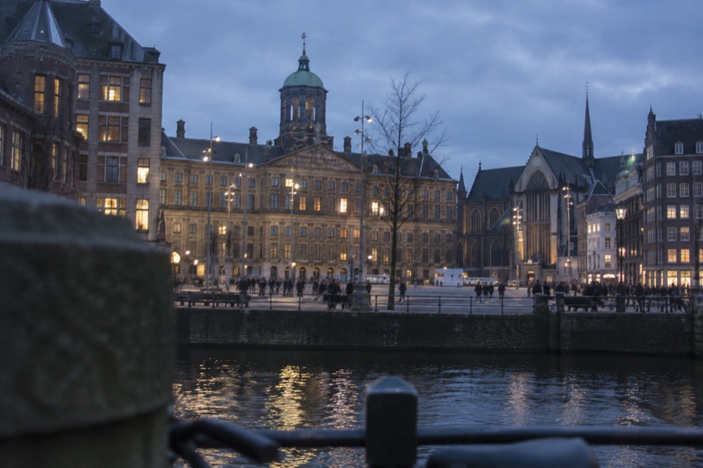 The frontage of Dam Square viewed from the opposite bank