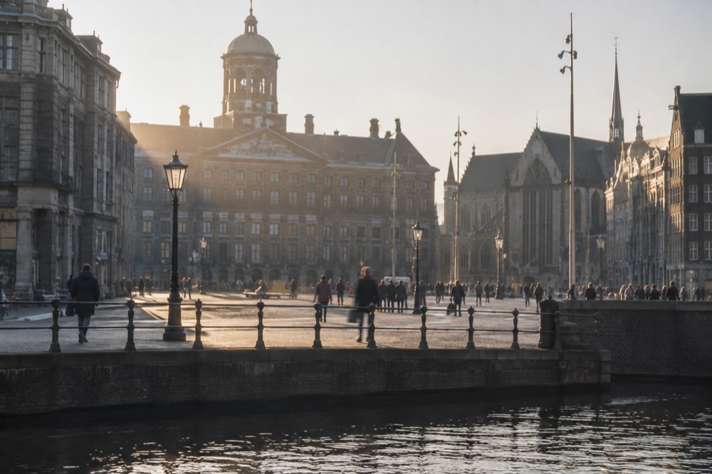 The frontage of Dam Square viewed from the opposite bank