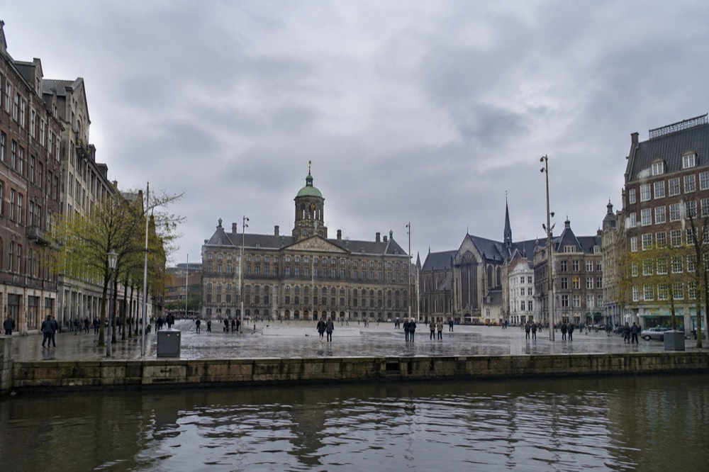 The frontage of Dam Square viewed from the opposite bank