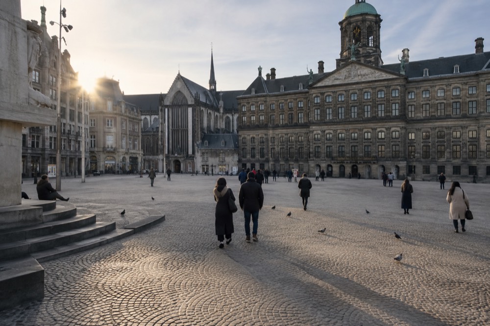 A street-level view of Dam Square on an ordinary weekday morning