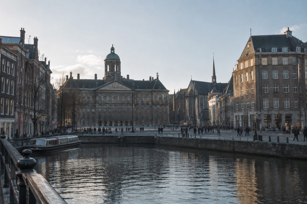 The frontage of Dam Square viewed from the opposite bank