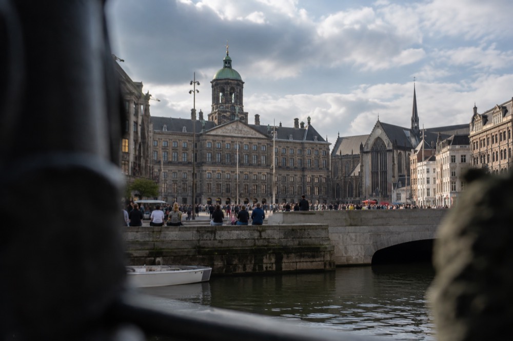 The frontage of Dam Square viewed from the opposite bank