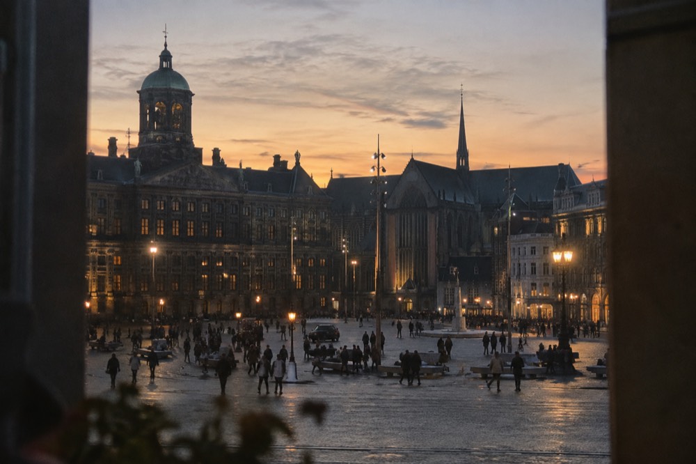 Low winter sun across the rooftops near Dam Square