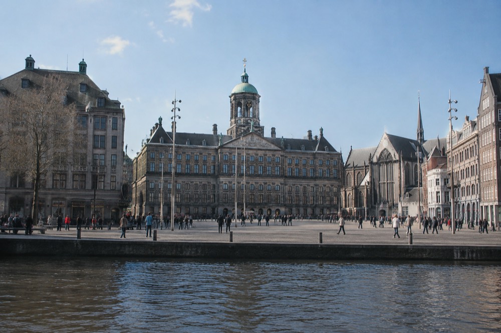 The frontage of Dam Square viewed from the opposite bank