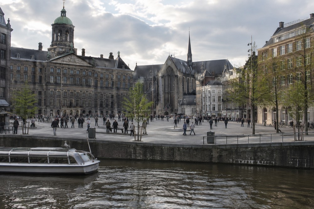 The frontage of Dam Square viewed from the opposite bank