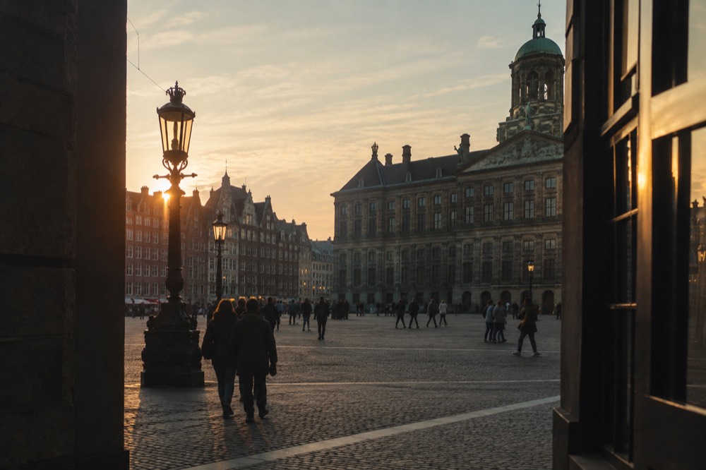 Low winter sun across the rooftops near Dam Square