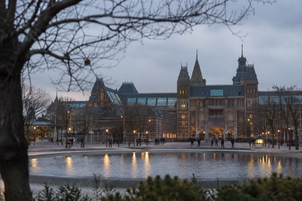 The Museumplein square with the Rijksmuseum building at dusk