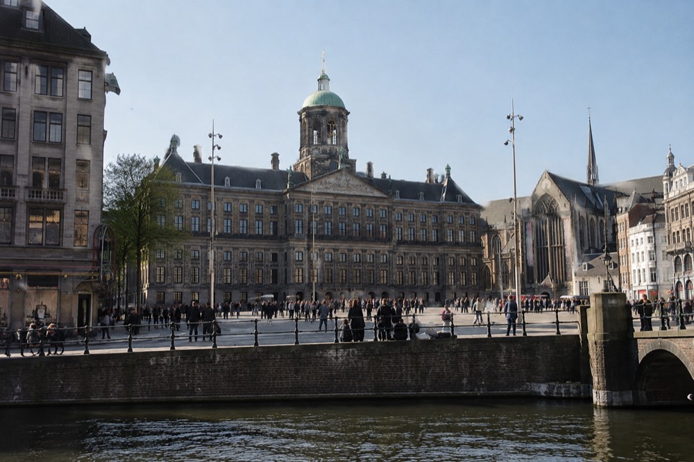 The frontage of Dam Square viewed from the opposite bank