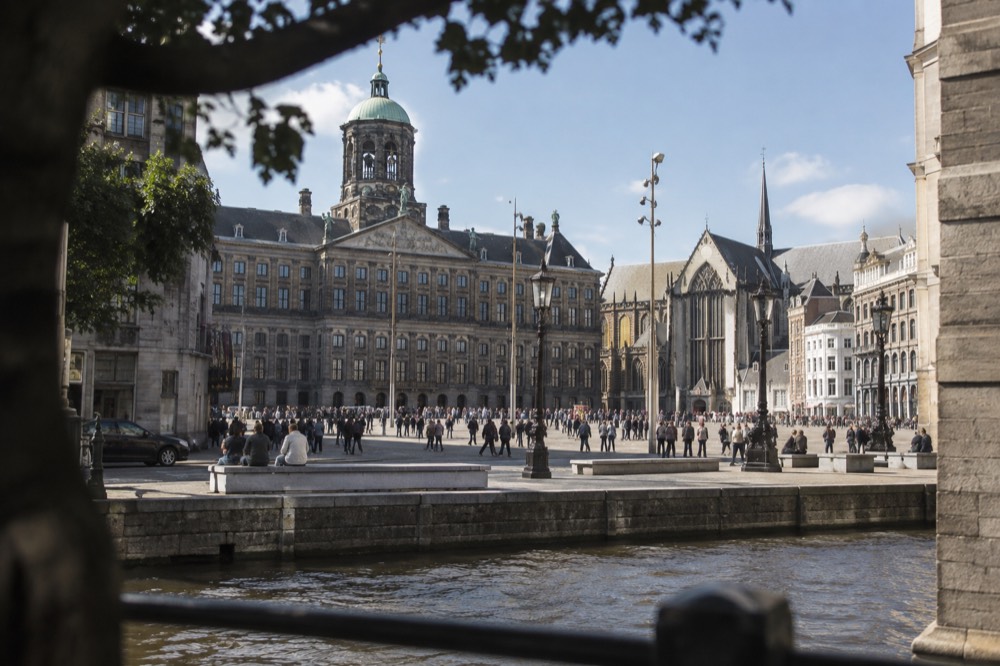 The frontage of Dam Square viewed from the opposite bank