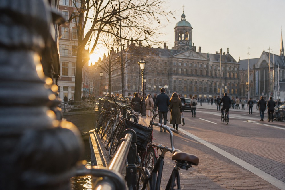 The approach to Dam Square, with bicycles leaning against the railings