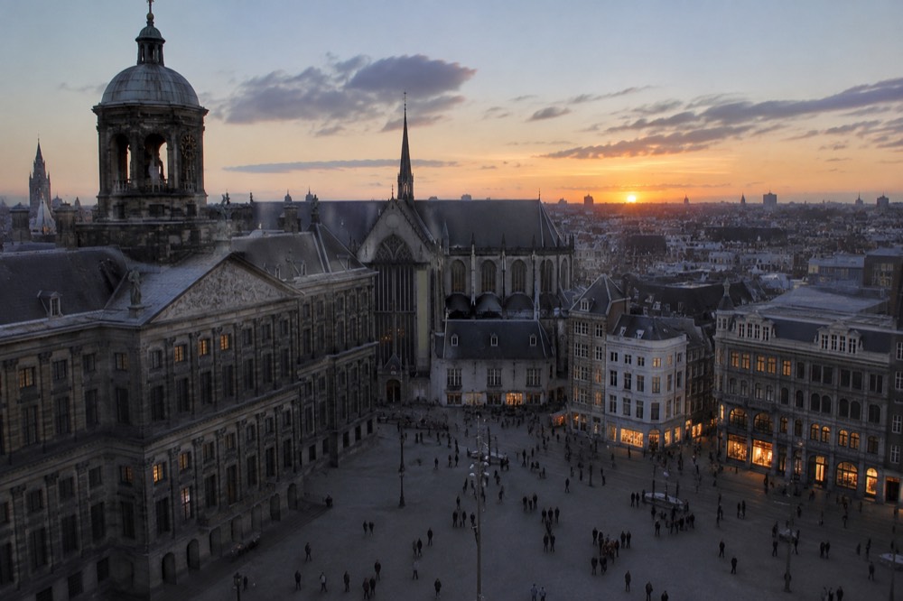 Low winter sun across the rooftops near Dam Square